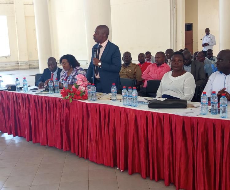 Homa Bay County Commissioner Ronald Mwiwawi heads the Ogande Girls High School's sensitization meeting on title deeds. Photos By Sitna Omar.