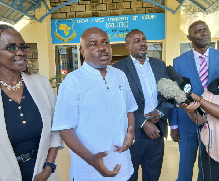 Labour and Skills Development Principal Secretary Shadrack Mwadime (Second Left), addressing the media at Great Lakes University of Kisumu (GLUK). PHOTO: CHRIS MAHANDARA