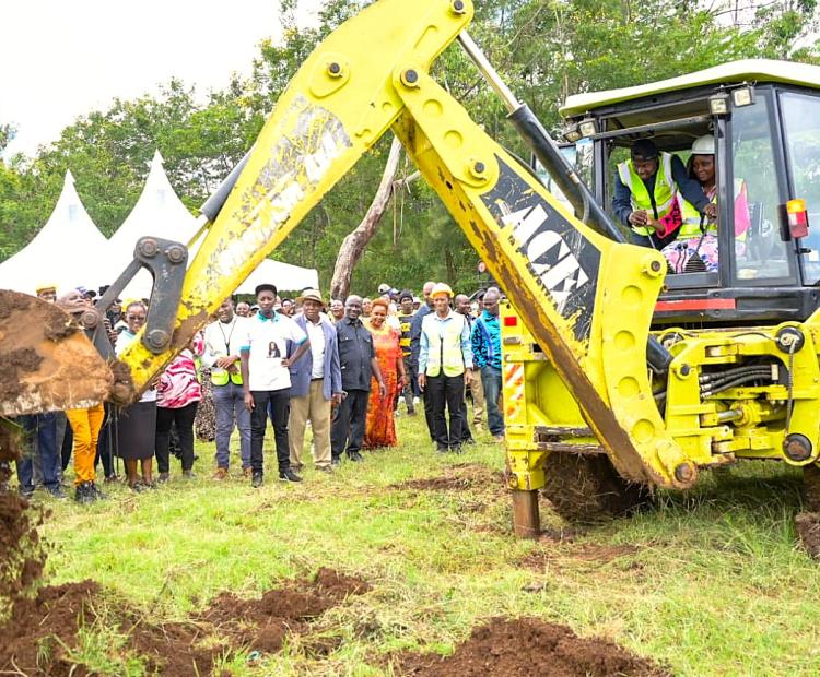 Embu Governor Cecily Mbarire operating a backhoe loader to mark the groundbreaking of Rupingazi-Weru Irrigation Scheme in Mbeti South Ward, Mbeere South Constituency. The Sh69.9 irrigation project targets to benefit over 360 households covering 150 hectares.  
