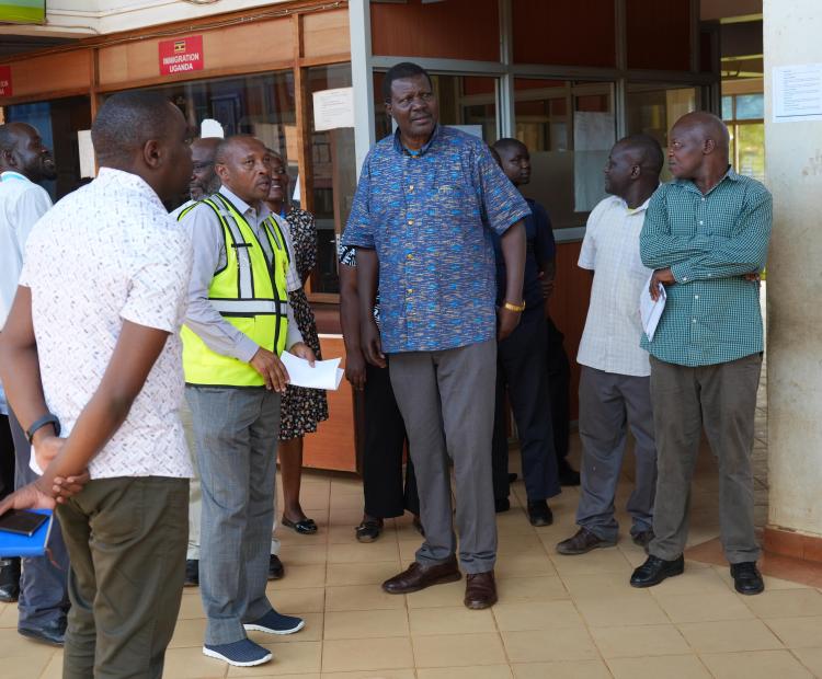 Prof. Elijah Sangok (in checked shirt) during the inspection at the Busia border port health. 