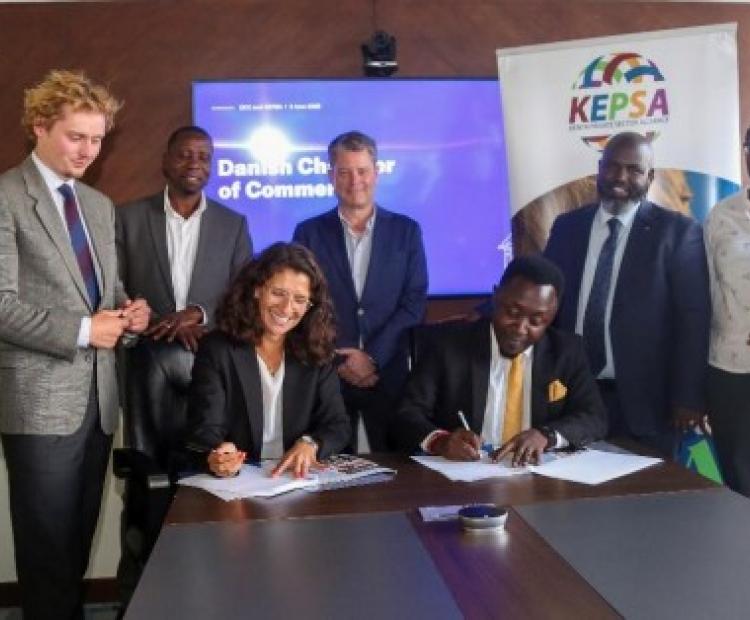 Sarah Jordan Torp (seated left) from the Danish Chamber of Commerce and Dr Jackson Koimburi, Head of KEPSA Consult and Senior Circular Economy and Climate Change Coordinator (seated right), signing a partnership agreement on behalf of the Danish Chamber of Commerce (DCC) and the Kenya Private Sector Alliance (KEPSA)