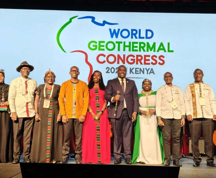 Principal Secretary for Energy Alex Wachira (centre, in suit) and members of Team Kenya pose for a photo after receiving the World Geothermal Congress 2029 hosting rights during the handover ceremony in Calgary, Canada. Nairobi will become the first African city to host the global geothermal gathering.