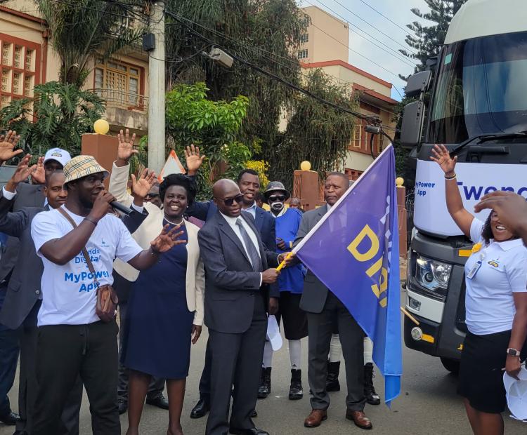 Acting Managing Director and CEO, Dr. Jeremiah Kiplangat (with flag), during the launch of the Twende Digital Customer Experience Roadshow in Nairobi, where he announced Kenya Power’s plans to fully transition to digital service delivery by 2027. Photo by Zipporah Odionyi.