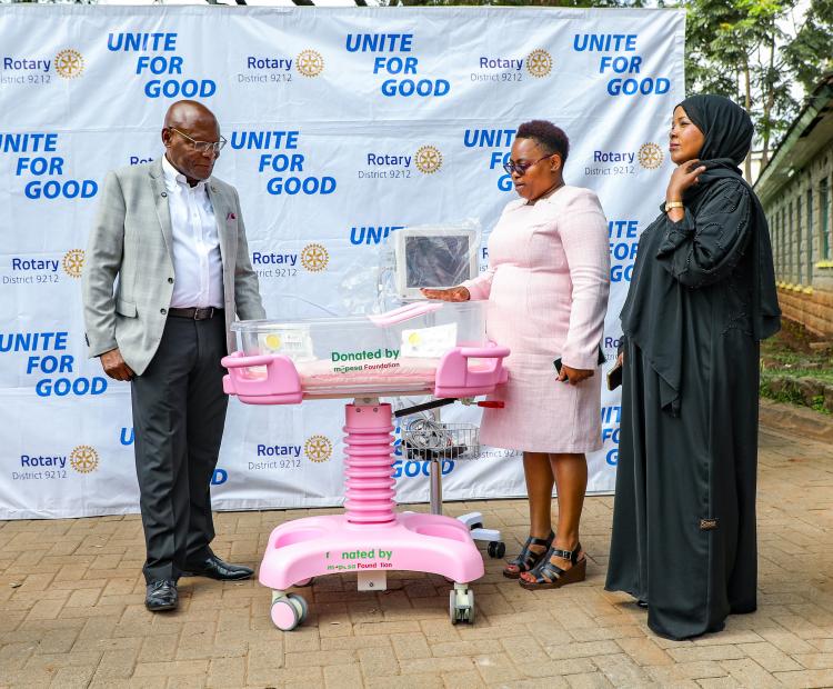 From left: Safaricom Foundation Chairman Joseph Ogutu, Pumwani Maternity Hospital CEO Christine Kiteshuo and Nairobi County Chief Officer for Medical Services Maryam Dahir inspect equipment donated to the hospital to support maternal and newborn healthcare services.