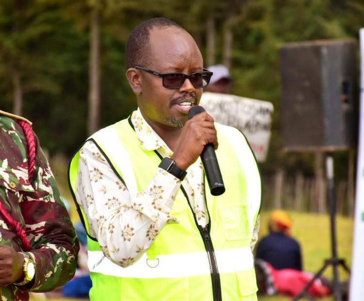 North Rift Valley Water Works Development Agency (NRVWWDA) General Manager for Infrastructure Development, Eng. Jimmy Kemboi, speaking during the site handover ceremony held at Kaptarkok Primary School grounds in Kaptarakwa Ward, Keiyo South Sub-County 