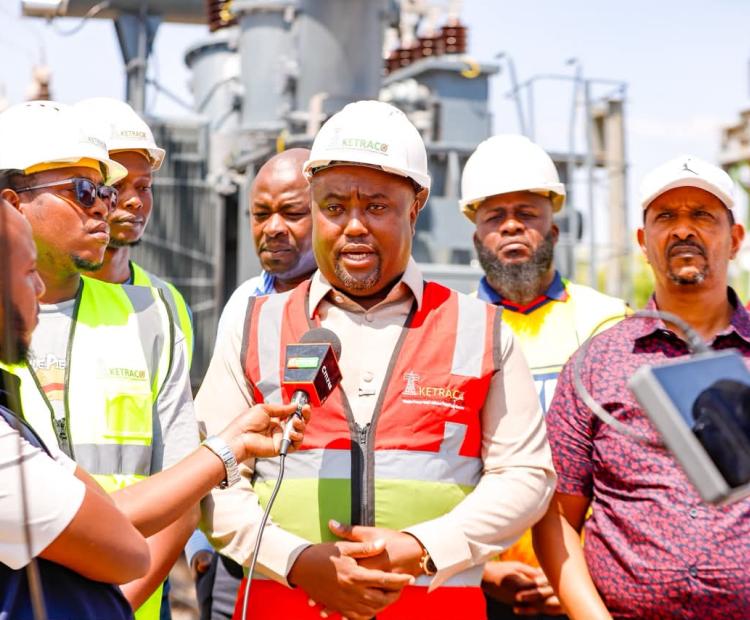 Energy PS Alex Wachira speaks at the Garissa Kenya Power substation after inspecting the progress of the commissioning of a new 23 MVA transformer.