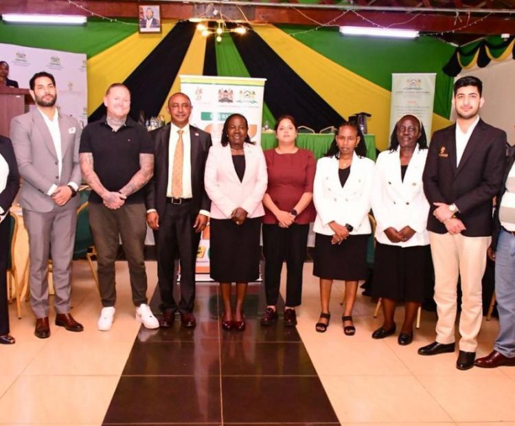 Ps TVETs Esther Muoria with chief principals drawn from different TVET institutions and Signet institute of Australian officials pose for a photograph