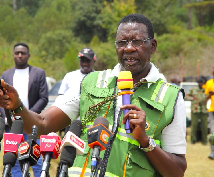 Roads and Transport Cabinet Secretary Davis Chirchir addresses residents at Makutano in Londiani Sub-County during a demonstrative tree-planting exercise to mark Mazingira Day in Kericho County.